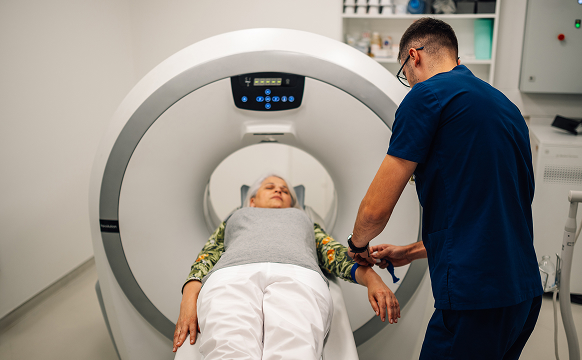 healthcare-worker-adjusting-patient-before-ct-scan-2025-04-03-20-03-59-utc 1.jpg